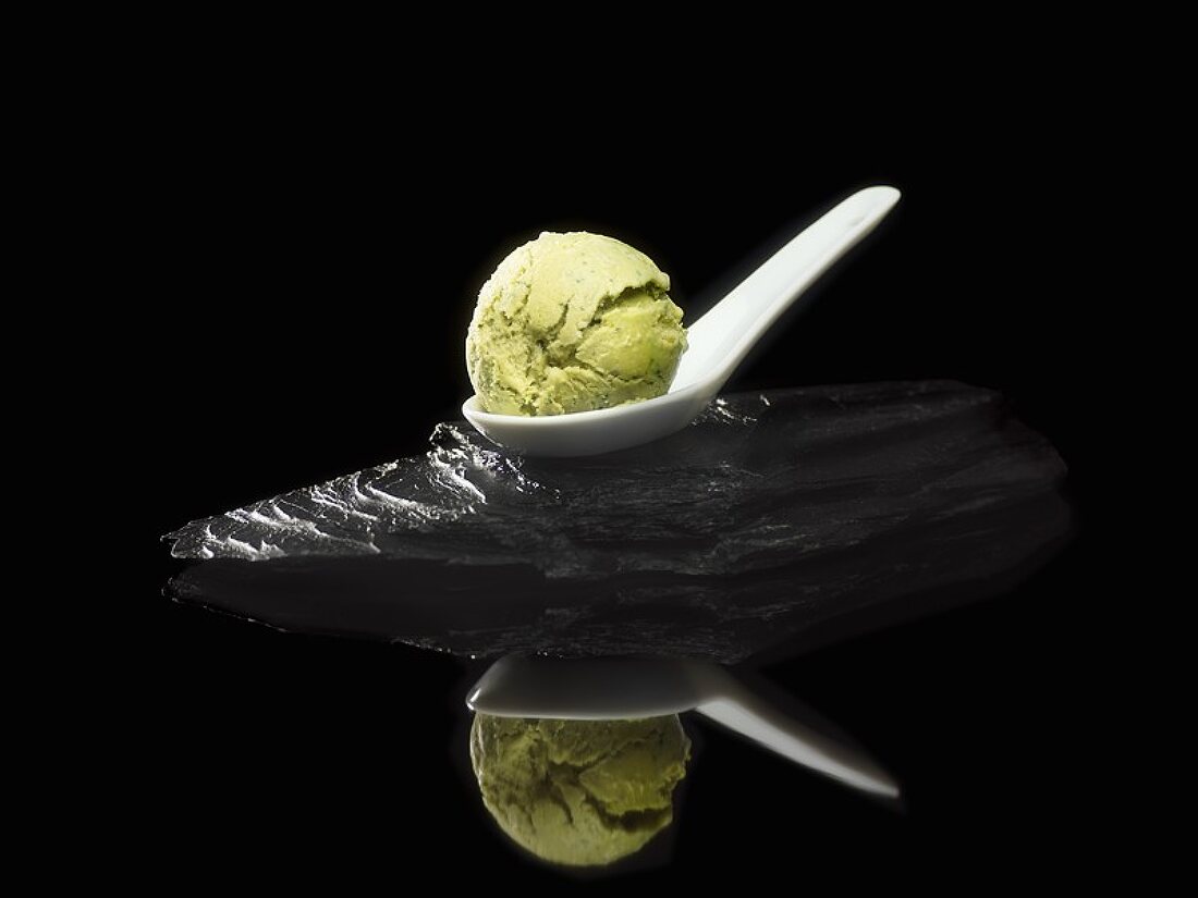Green tea mint ice cream on spoon