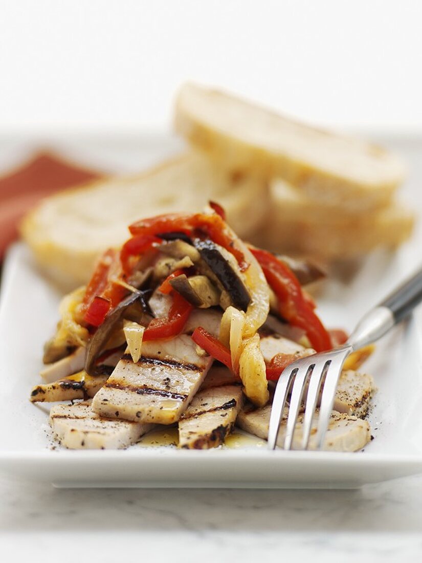 Grilled pork fillet with aubergine and peppers