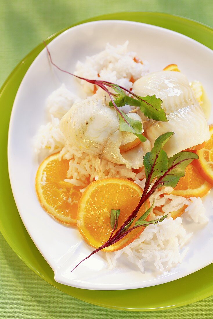Sole with orange slices and rice