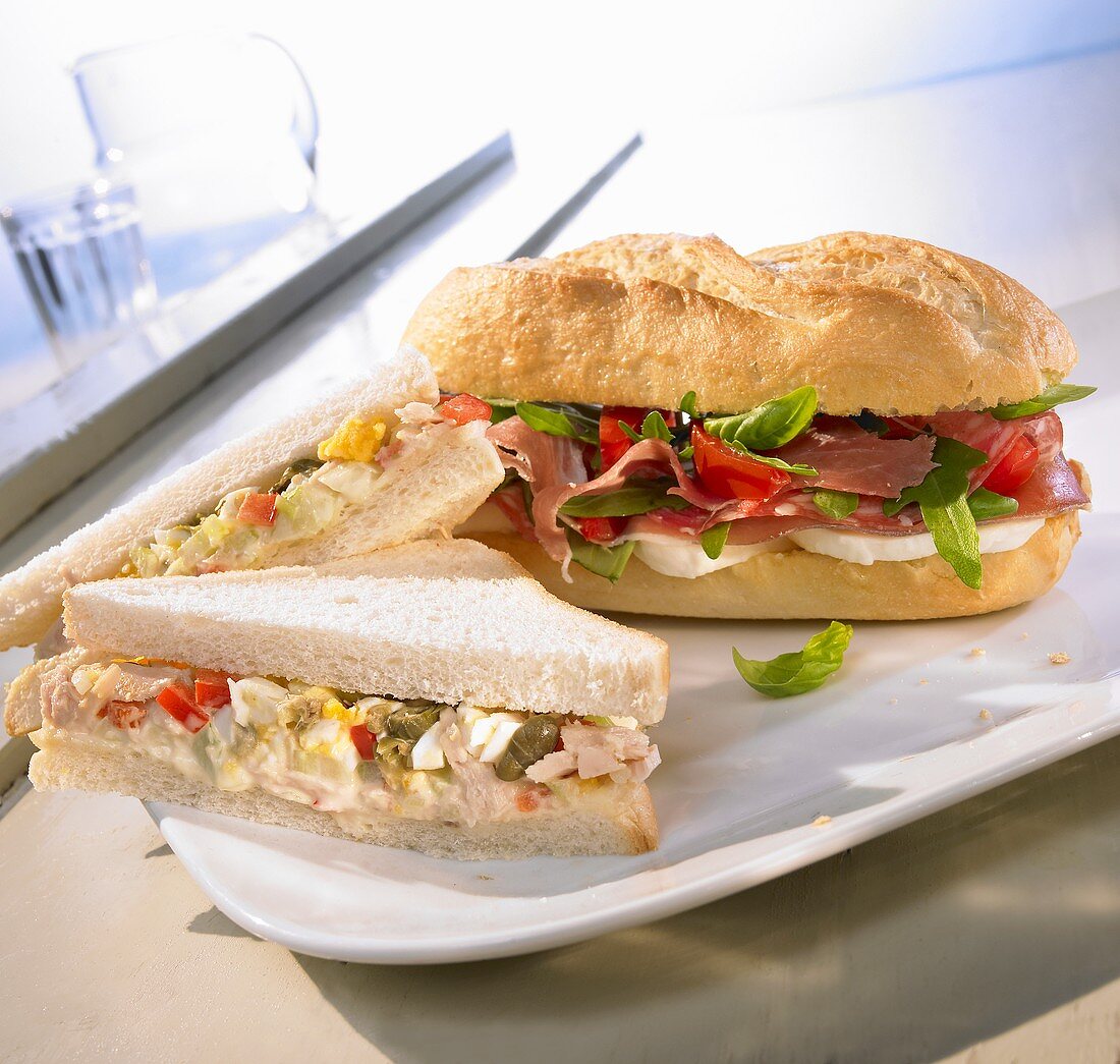 Tuna sandwich and Parma ham and mozzarella sandwich