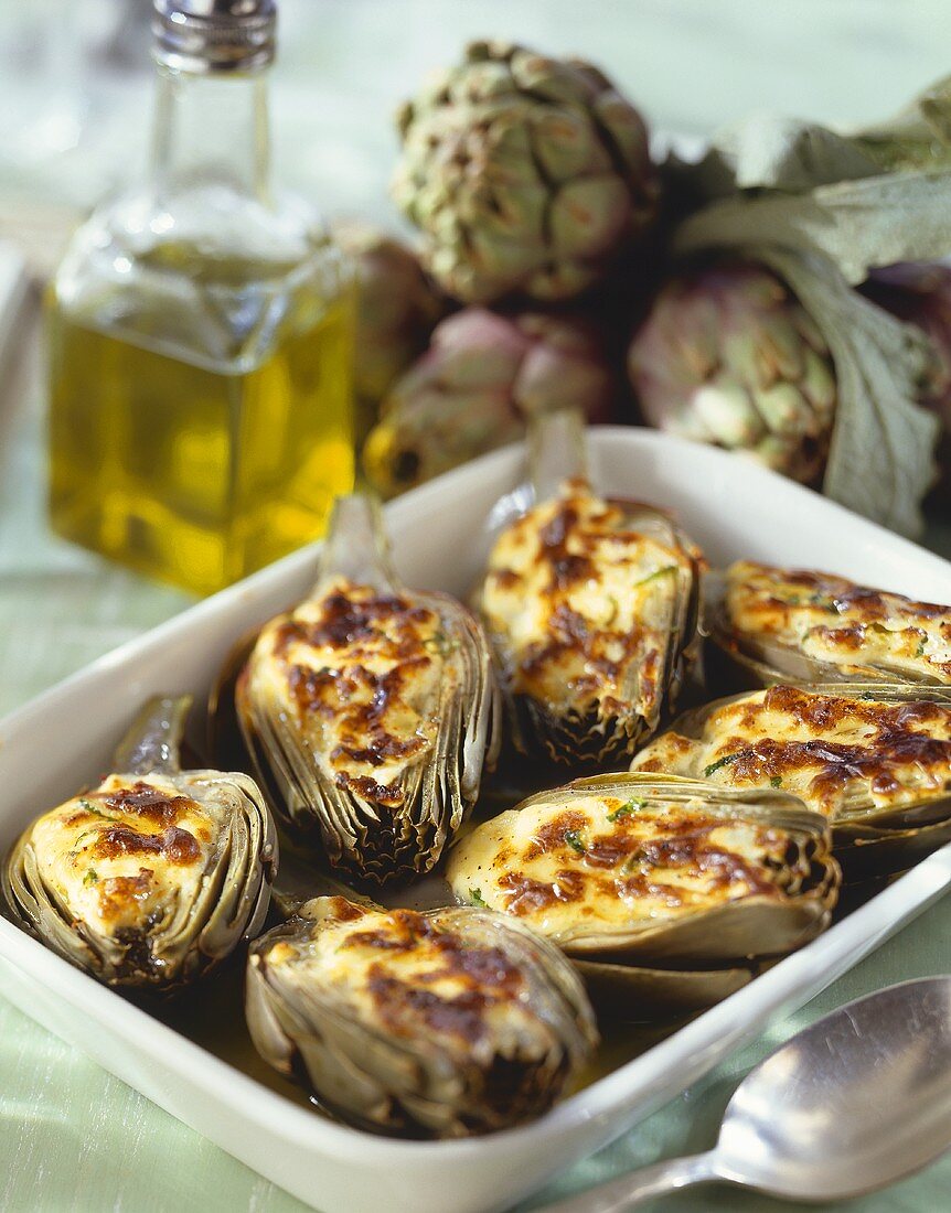 Baked artichokes with cheese topping