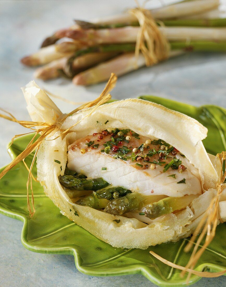 Cod on asparagus baked in pastry