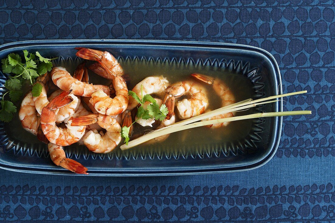 Prawns in stock with lemon grass