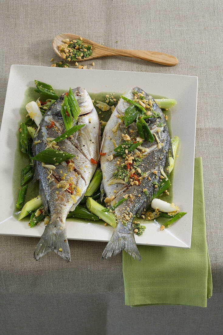 Seabream with spring onions in chilli oil with peanuts