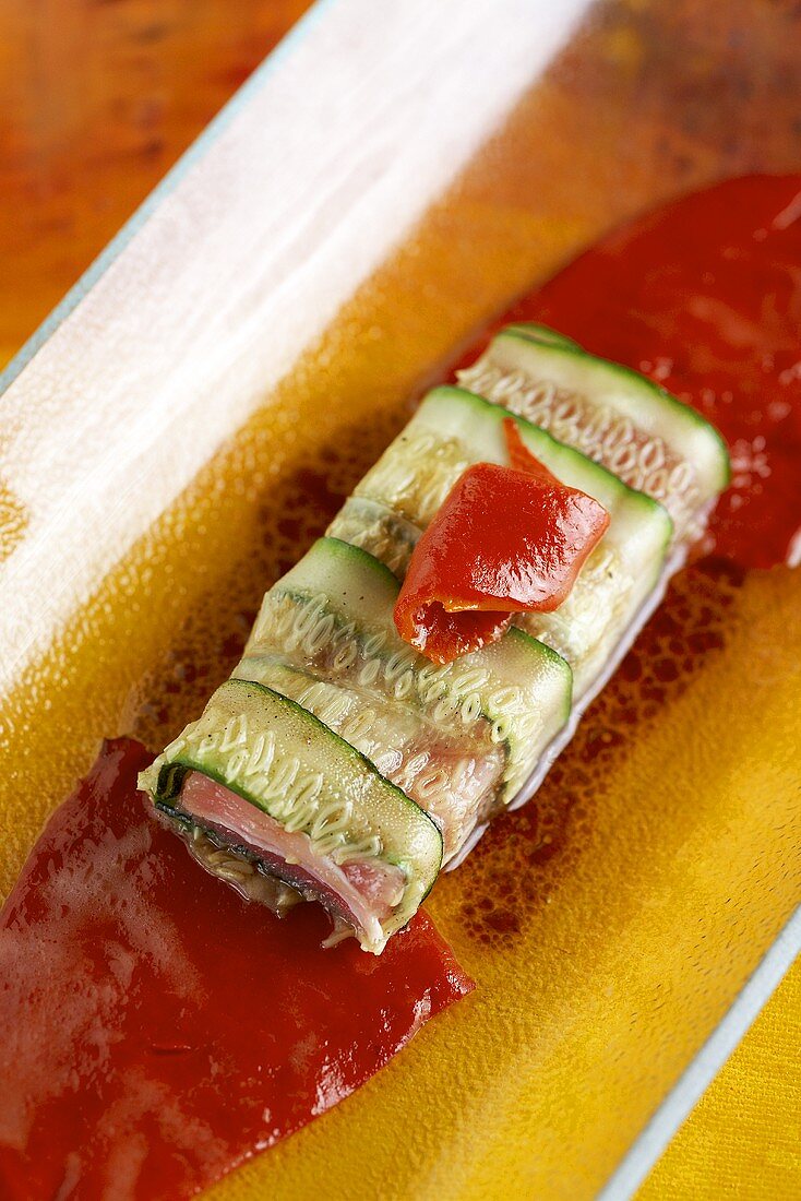 Tuna wrapped in courgette on red pepper (Spain)
