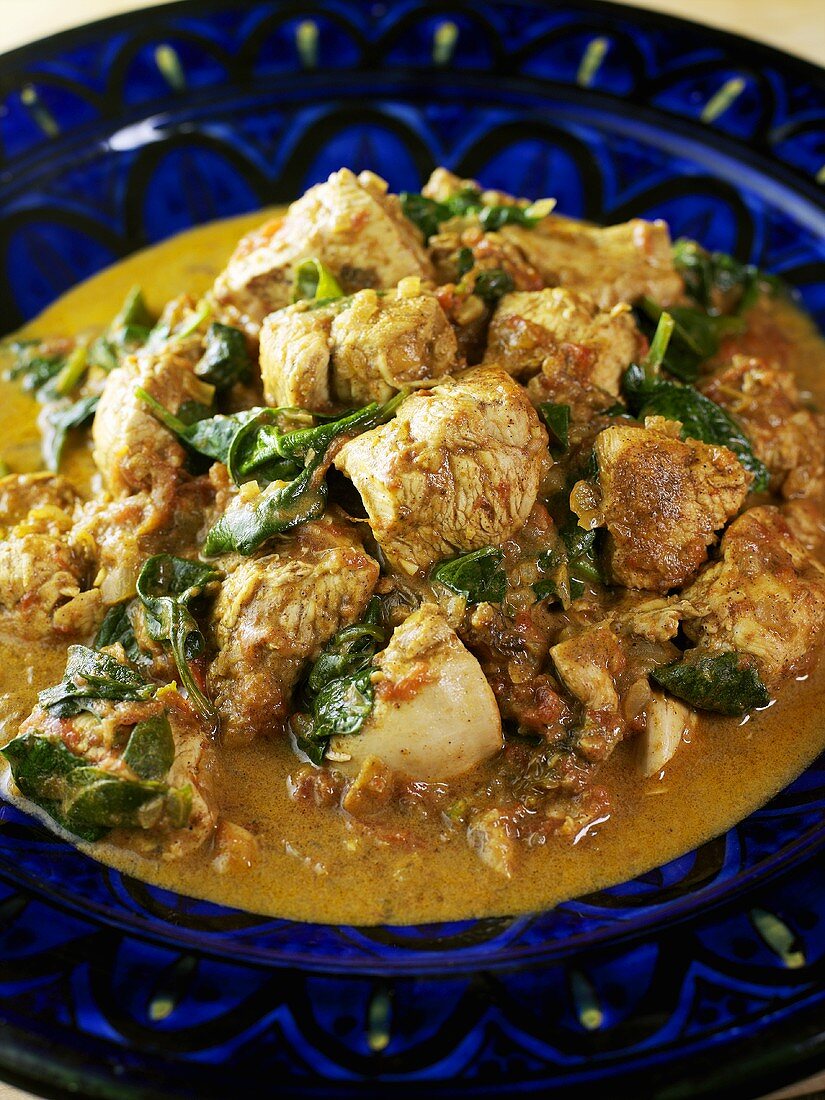 Pork and spinach curry