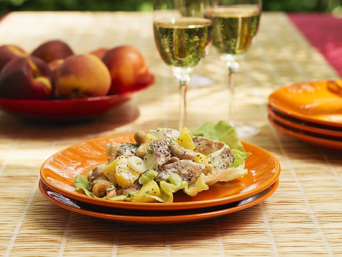 Chicken and peach salad with peanuts