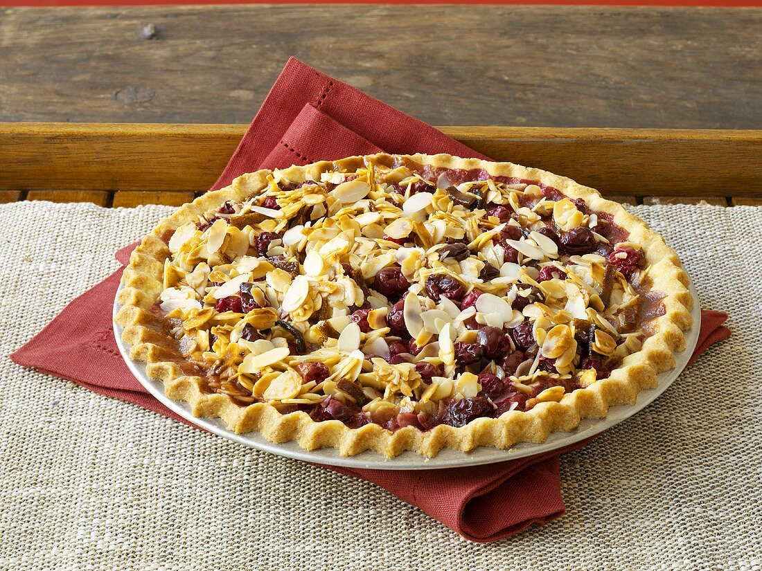 Cranberry tart with flaked almonds