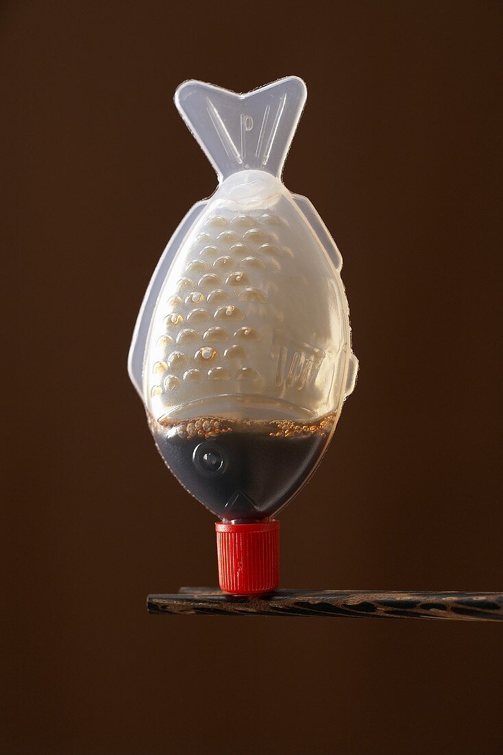 Soy sauce in a small fish-shaped bottle