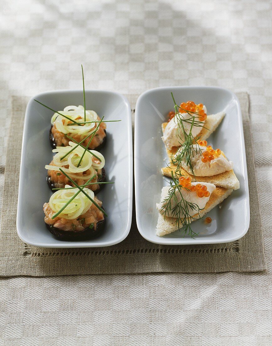 Salmon tartare on pumpernickel and trout cream on toast