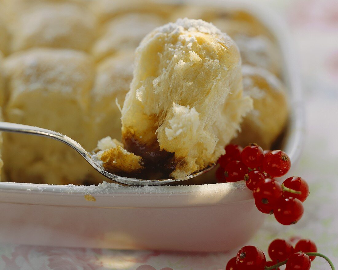 Buchteln (yeast dumplings) with toffee filling & redcurrants