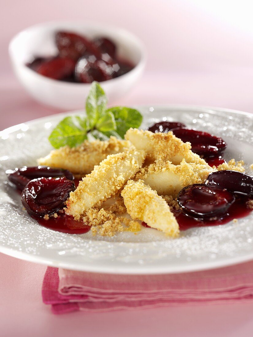 Potato noodles with buttered breadcrumbs and plum compote