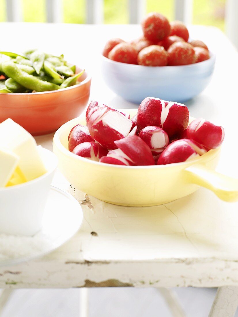 Three dishes of fresh vegetables (for crudités)