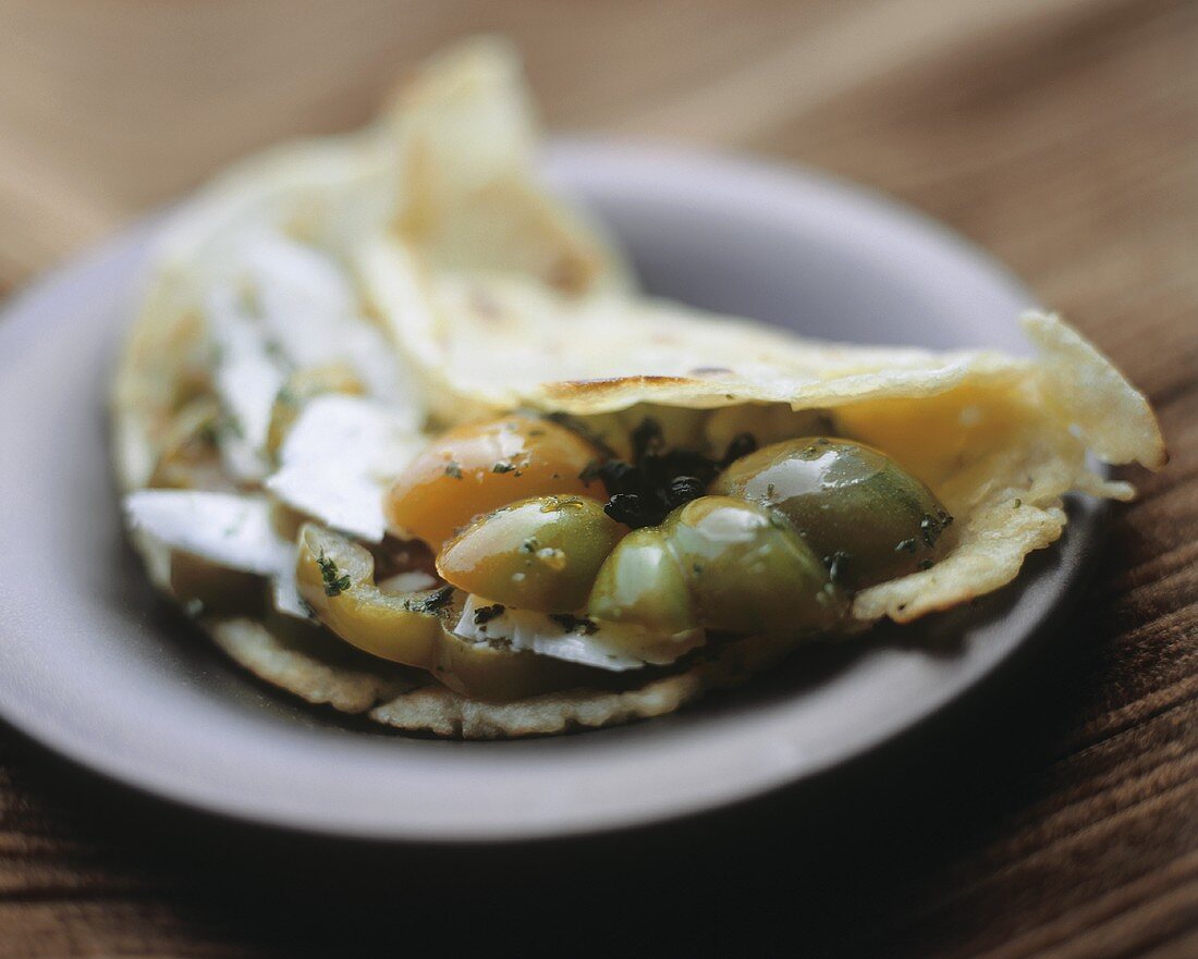 Tortilla mit Tomaten und Schafskäse (Ricotta di Pecora)