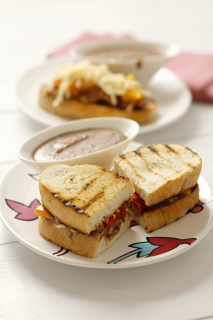 Grilled pepper panini with black bean dip
