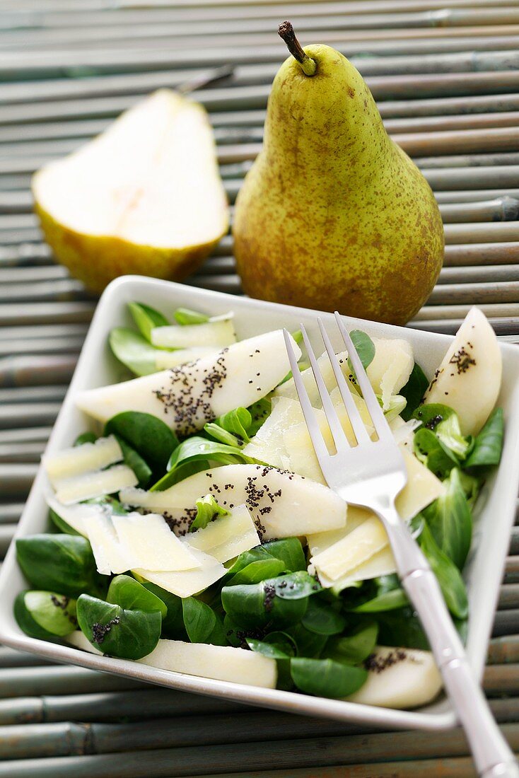 Pear & watercress salad with Parmesan & poppy seed dressing