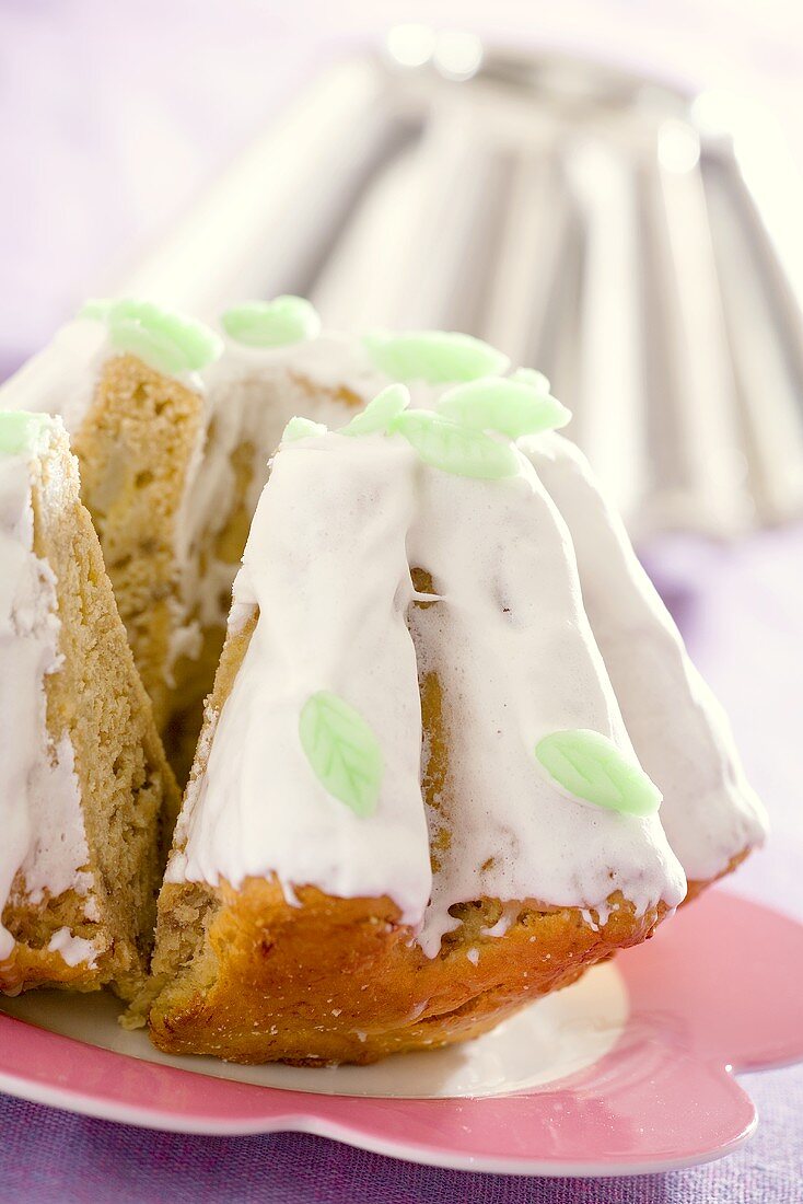 Polish Easter cake with icing and marzipan leaves