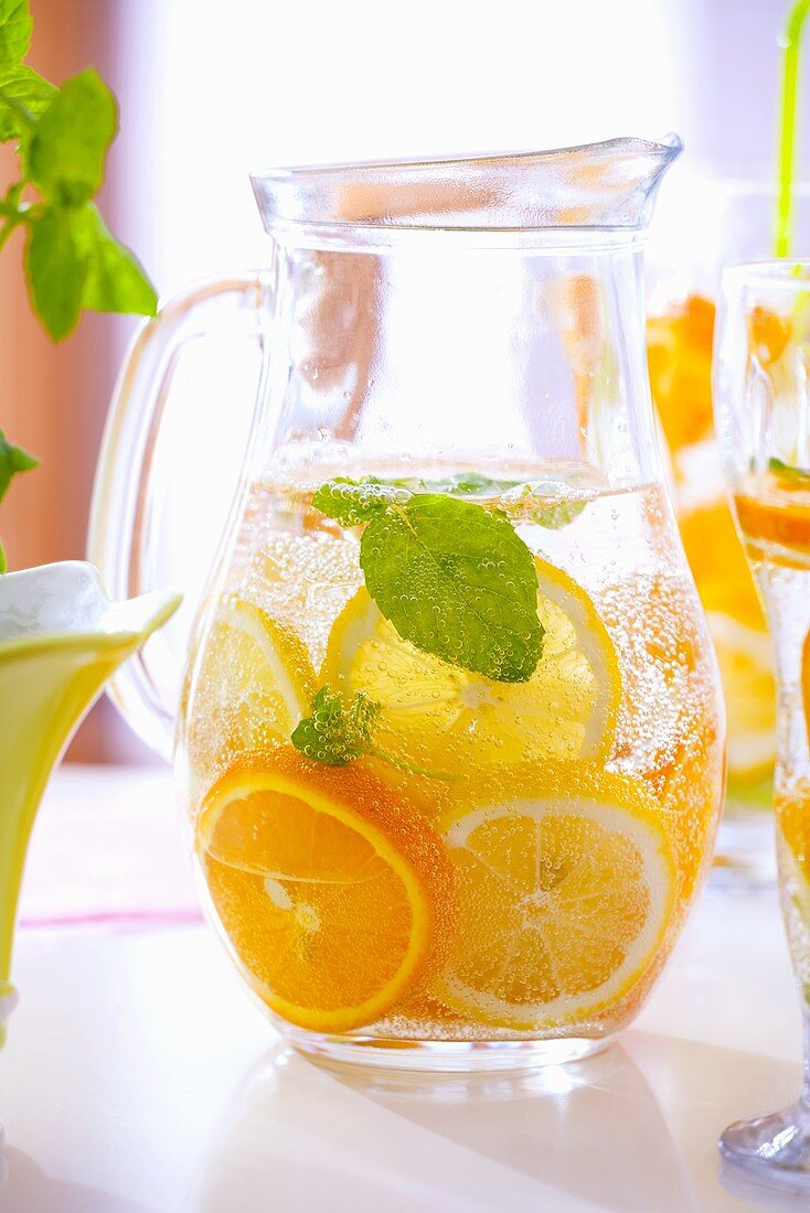 Lemonade with slices of orange and lemon