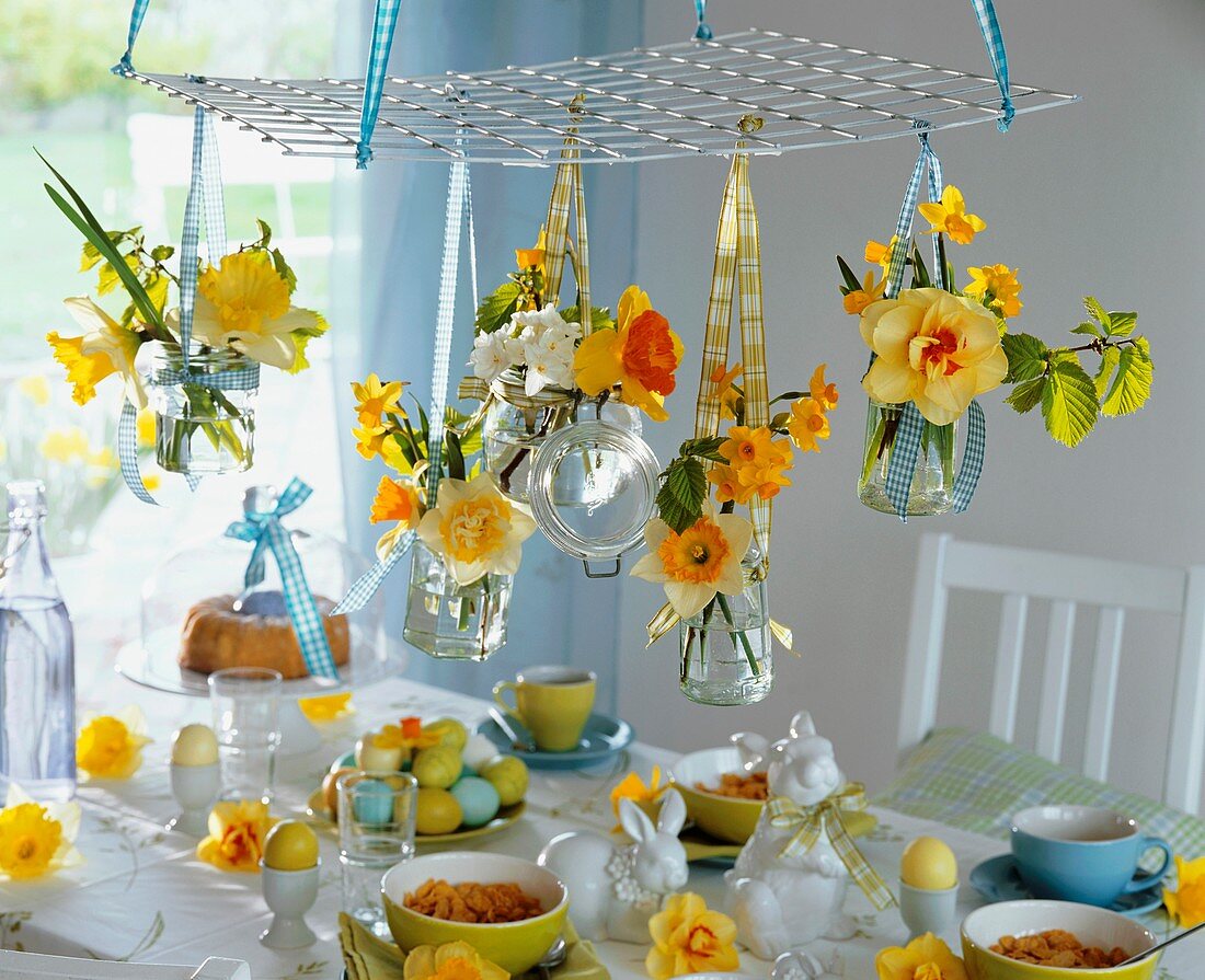 Easter breakfast table decorated with narcissi