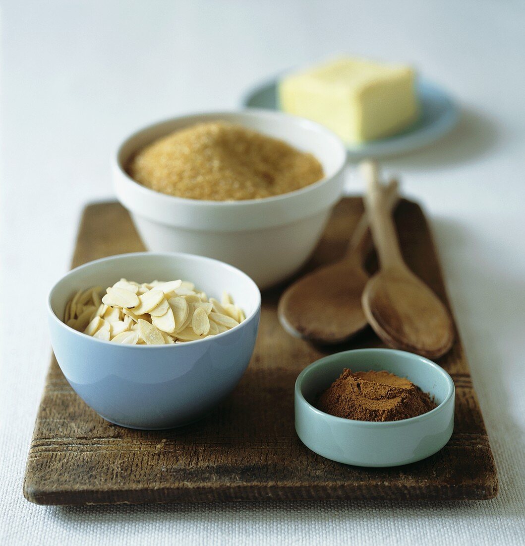 Ingredients for crumble (cinnamon, almonds, breadcrumbs, butter)