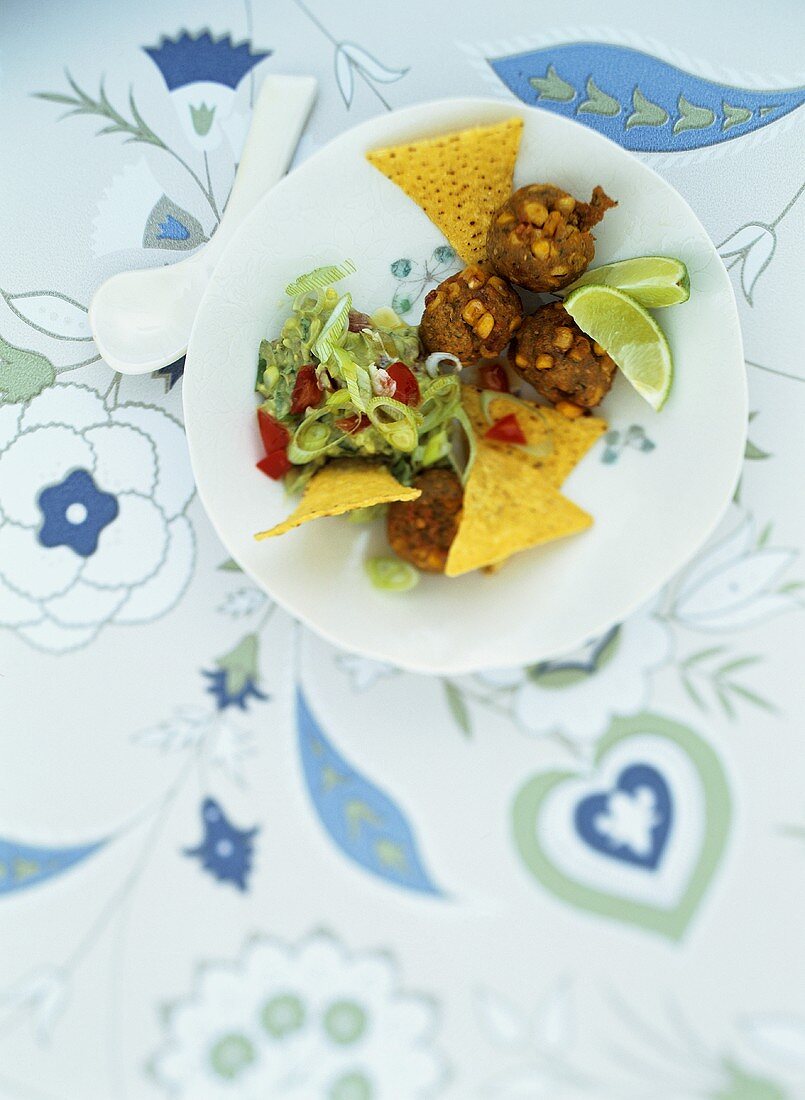 Sweetcorn falafel with guacamole and taco chips