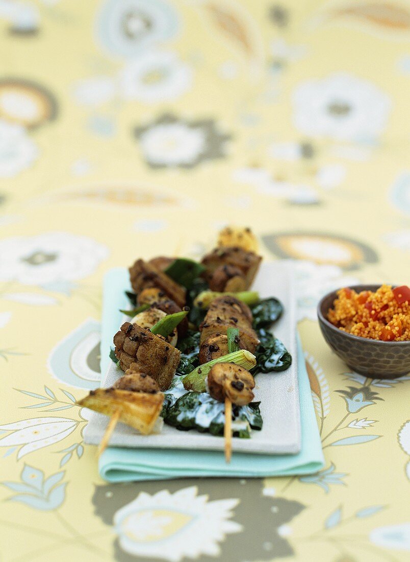 Seitan kebabs with spinach yoghurt & millet with red pepper