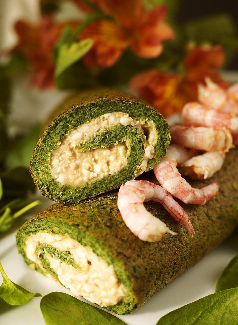 Nettle roulade with cottage cheese filling and shrimps