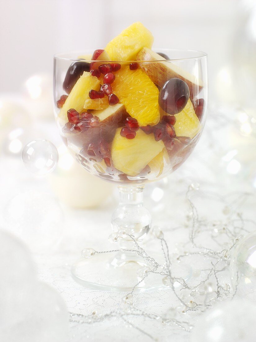 Fruit salad with pomegranate seeds for Christmas