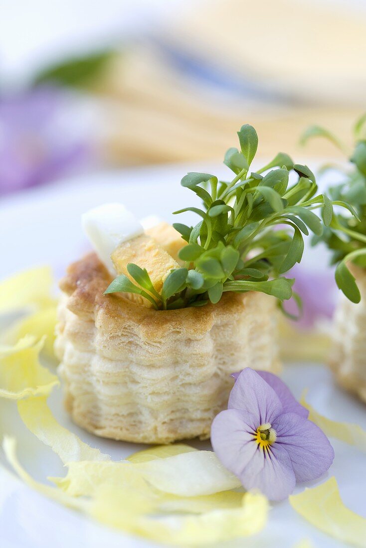 Vol-au-vent case filled with egg and cress
