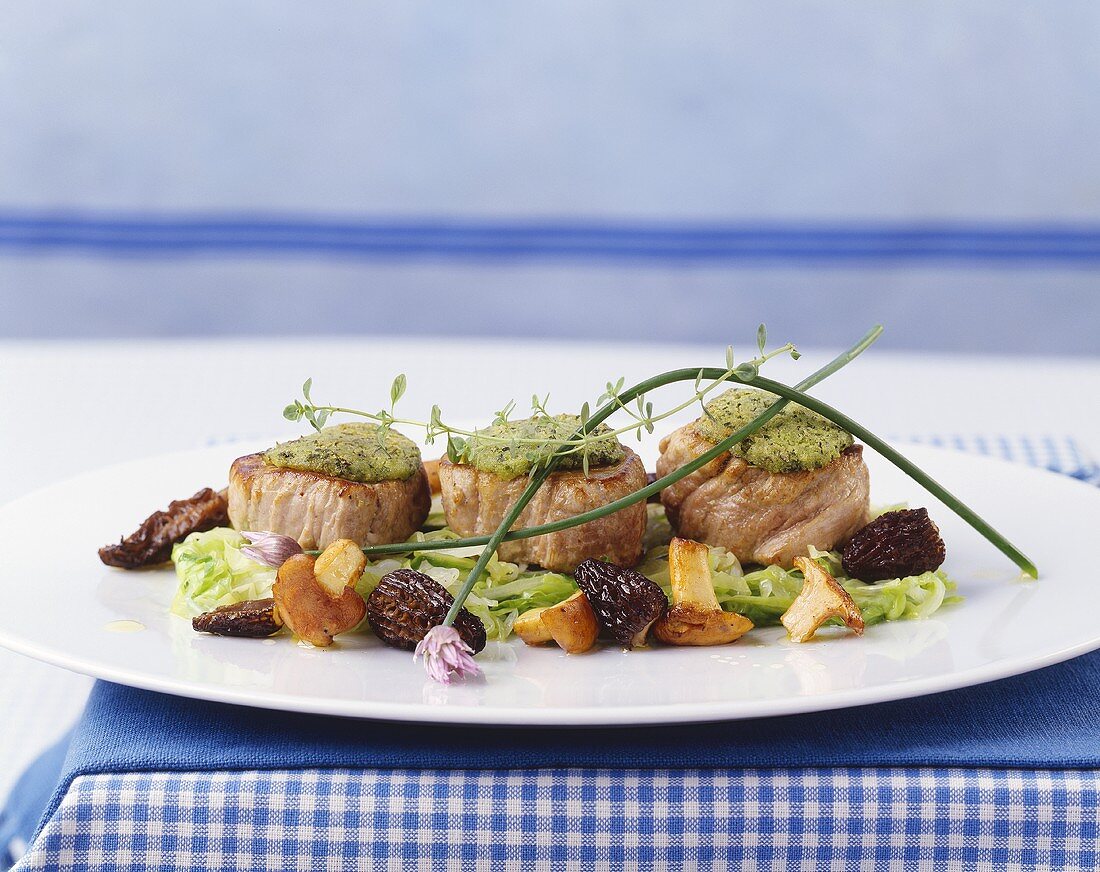 Fried pork fillet with soft cheese crust and morels