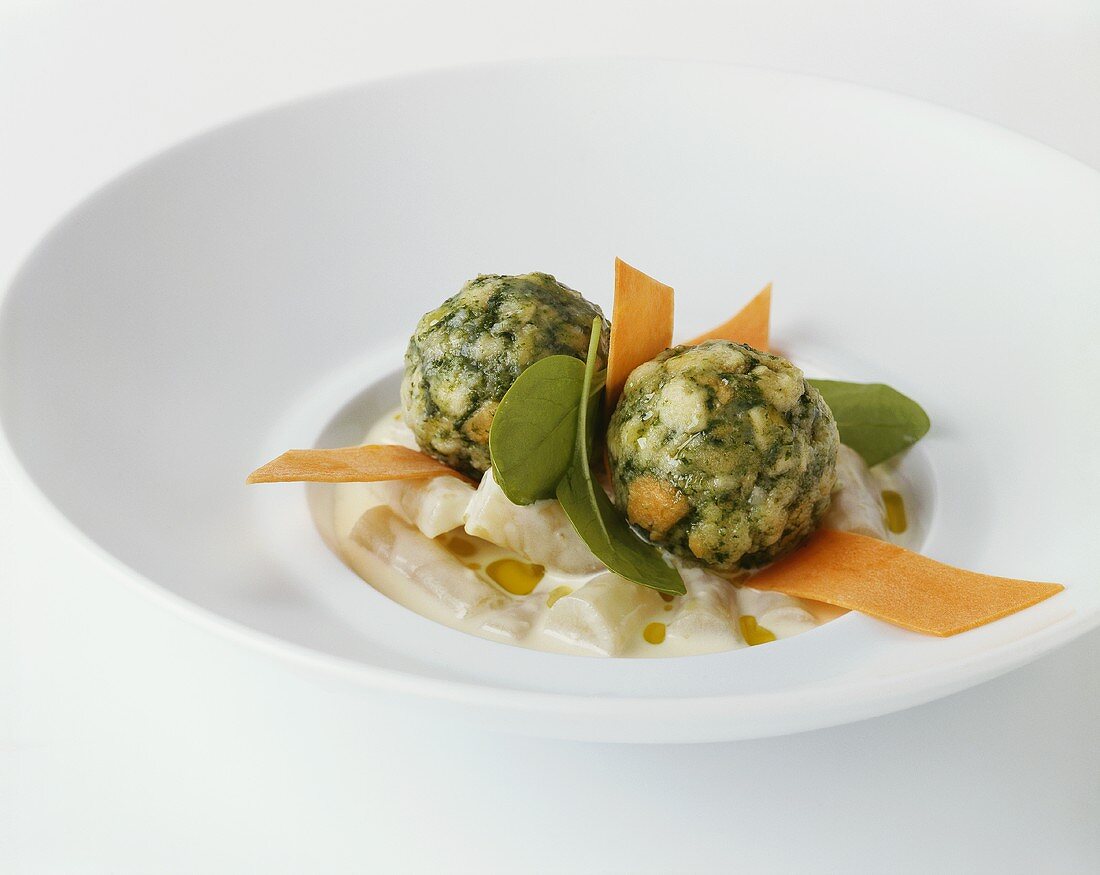 Spinach dumplings with scorzonera ragout
