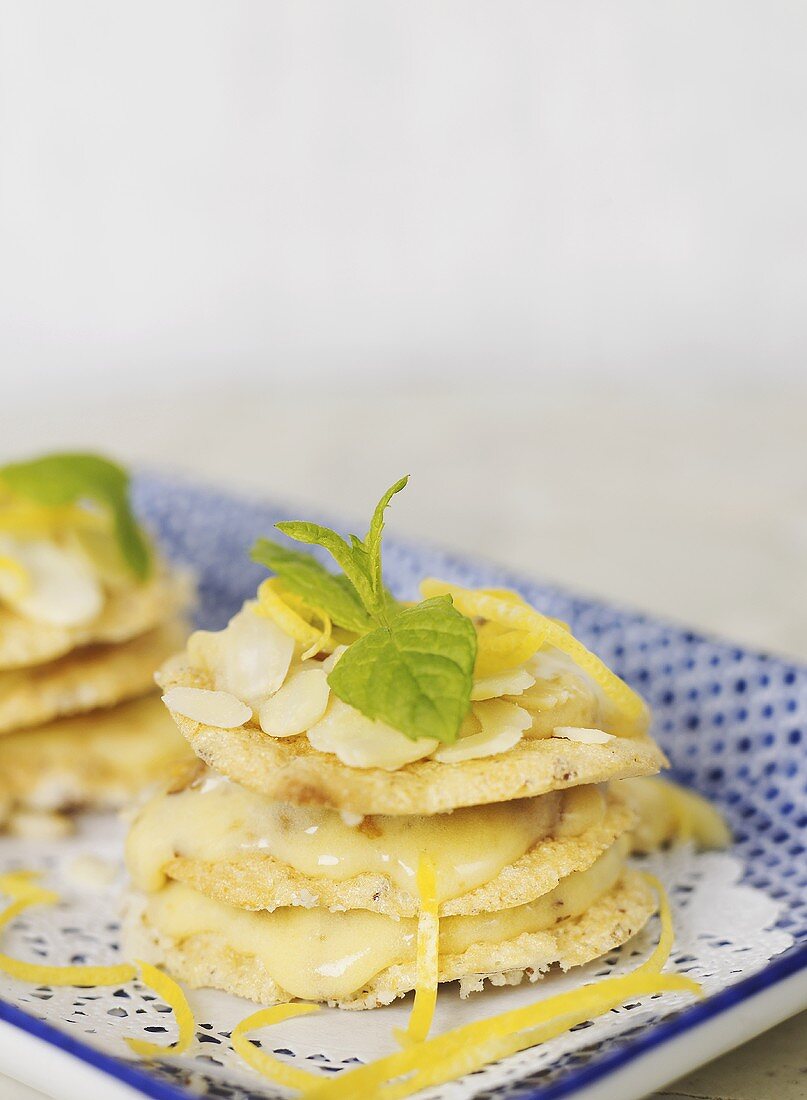 Almond meringues with nougat and custard