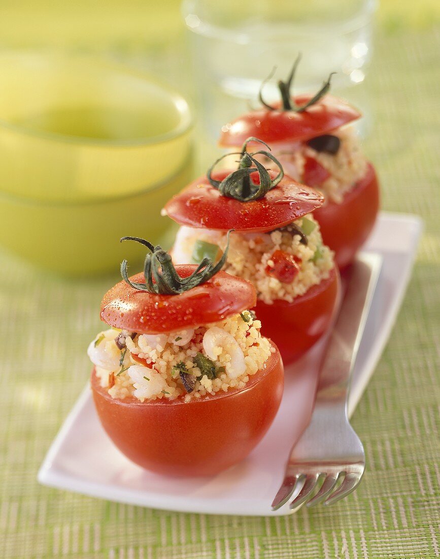 Tomatoes stuffed with couscous and shrimp salad