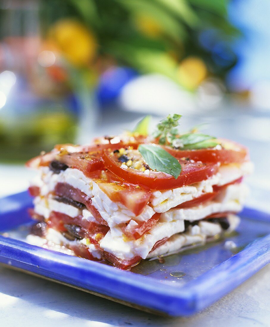 Layered tomato slices and feta cheese