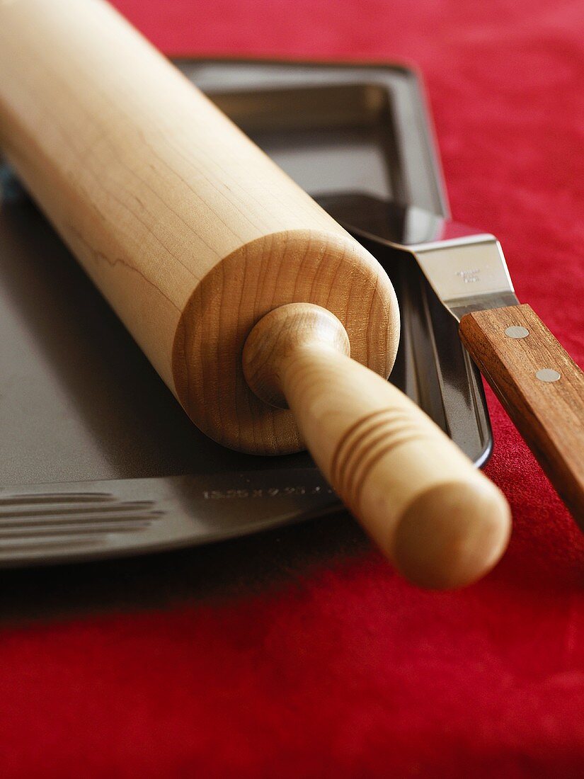 Rolling pin, baking tray and palette knife