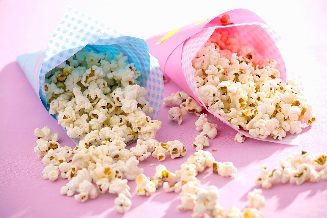 Two cones of popcorn