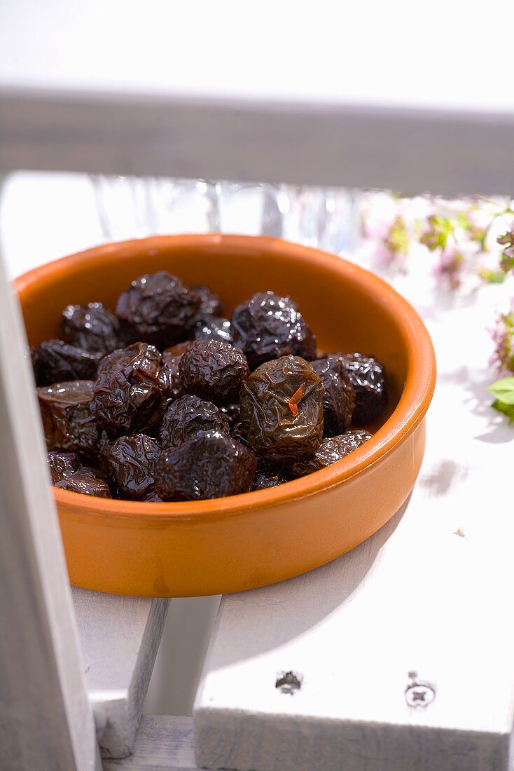Small dish of dried black olives