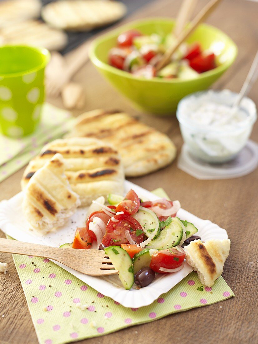 Vegetable salad with grilled flatbread