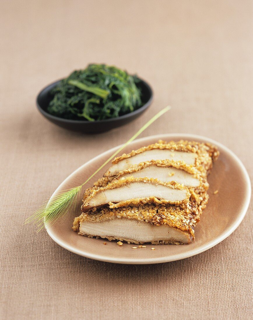 Sesame-coated turkey escalopes with spinach