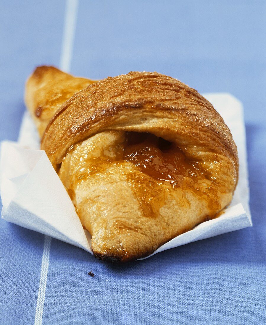 Croissant filled with apricot jam