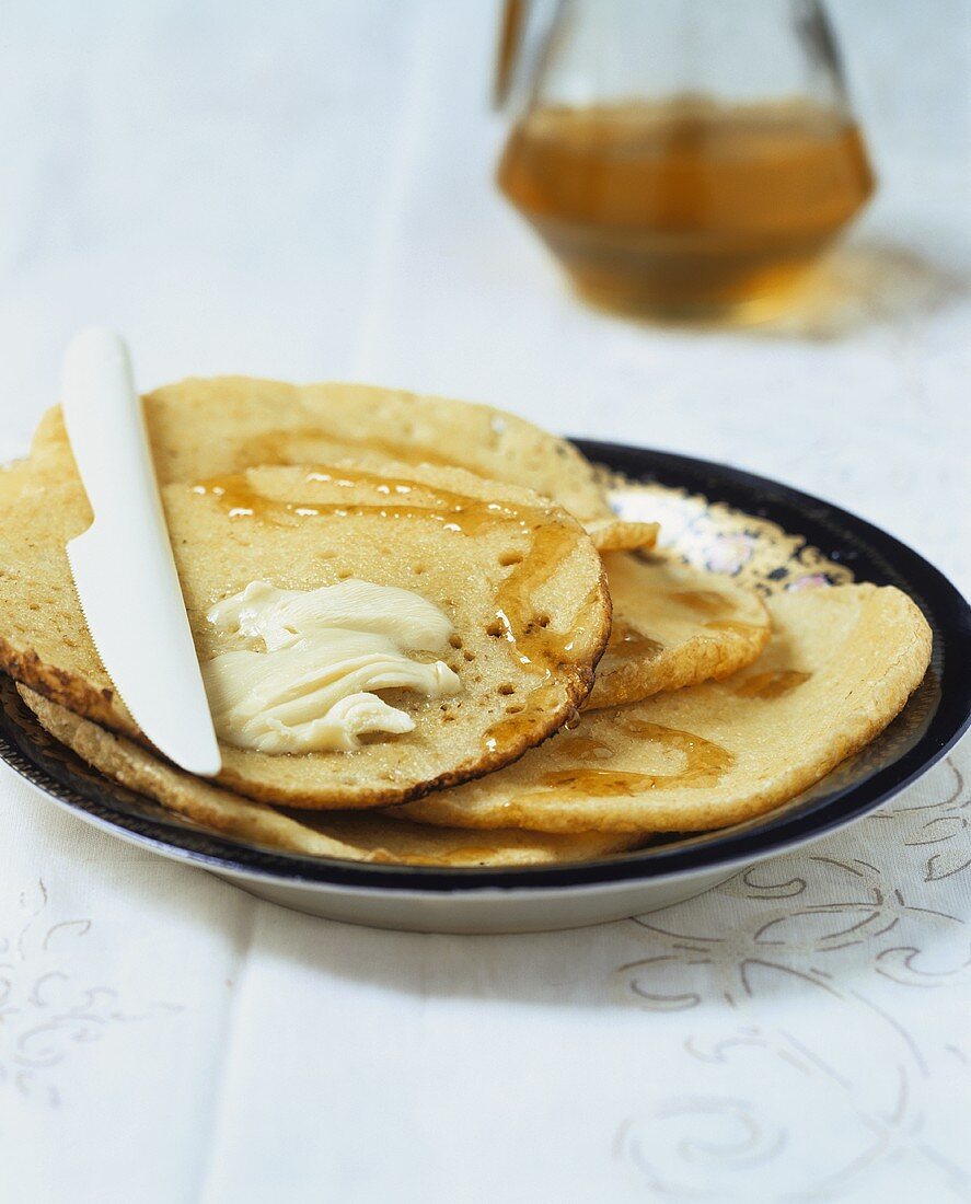 Beghrir (Moroccan pancakes) with butter and honey