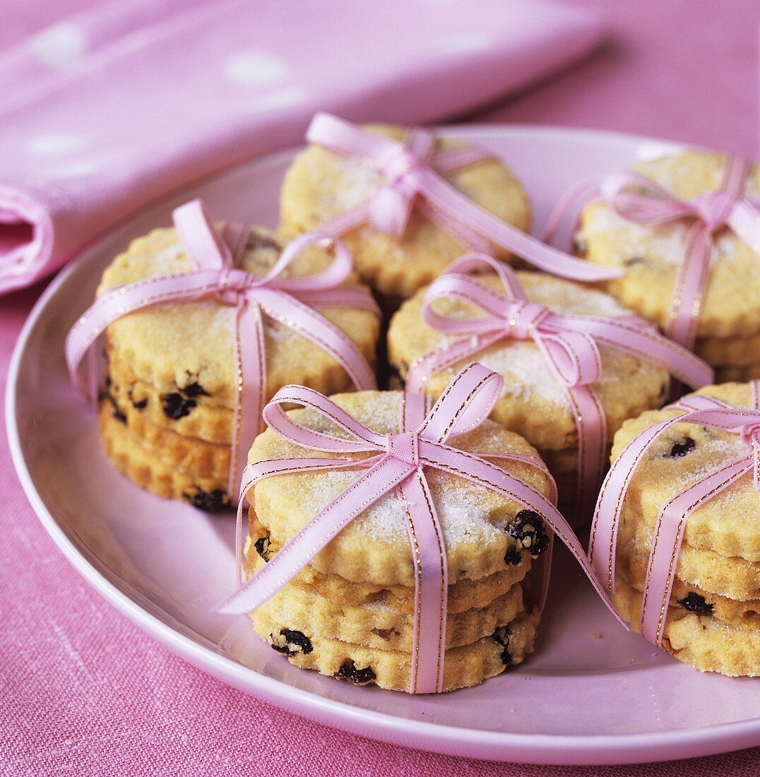 Biscuits tied together with pink gift ribbon