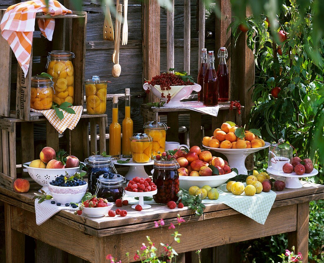 Still life with fresh and bottled fruit