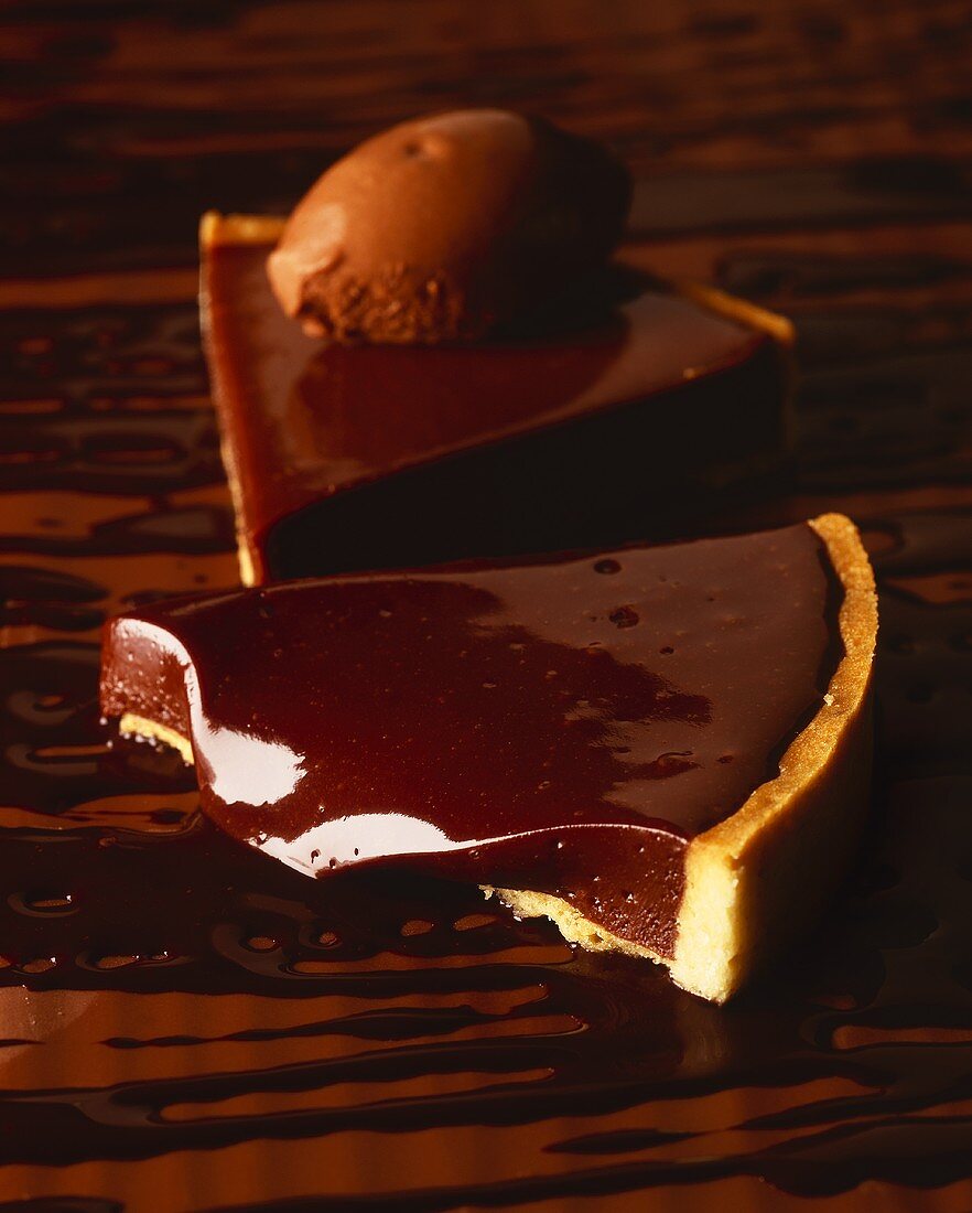 Two pieces of chocolate tart