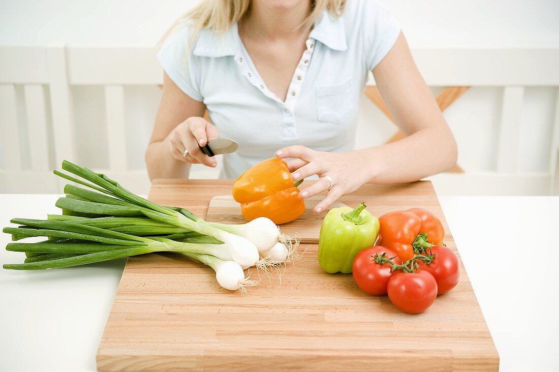Young woman with vegetables
