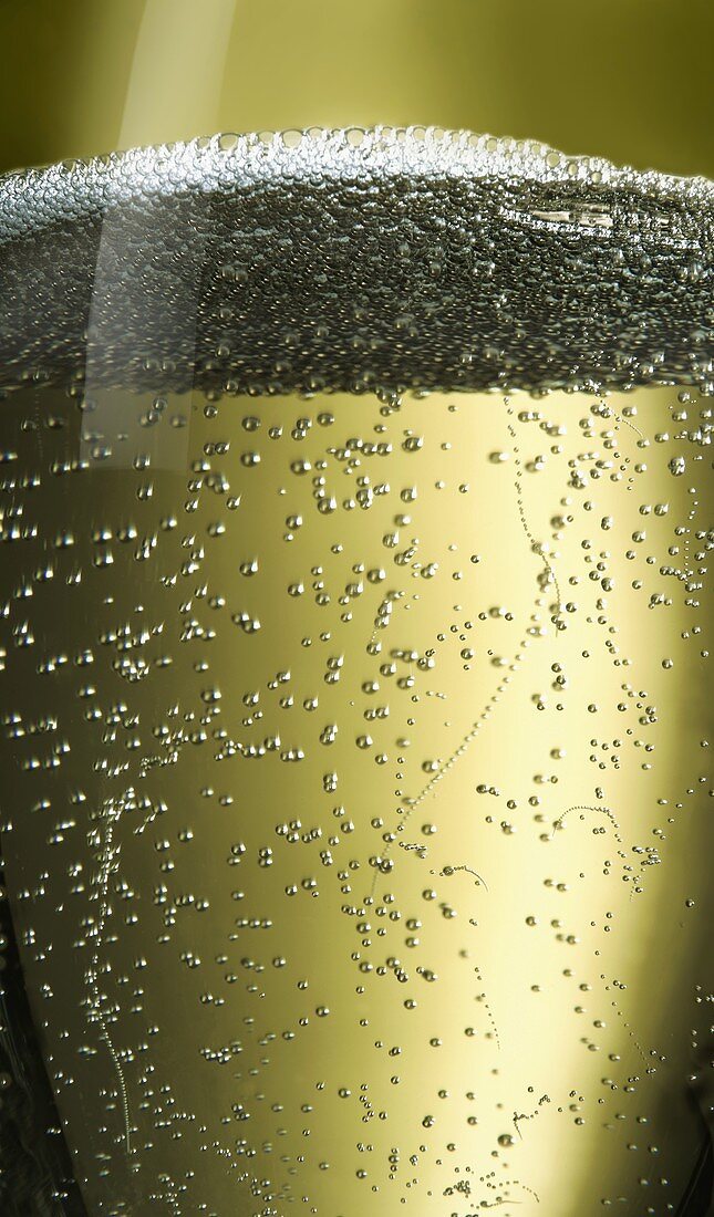 A glass of sparkling wine (detail)