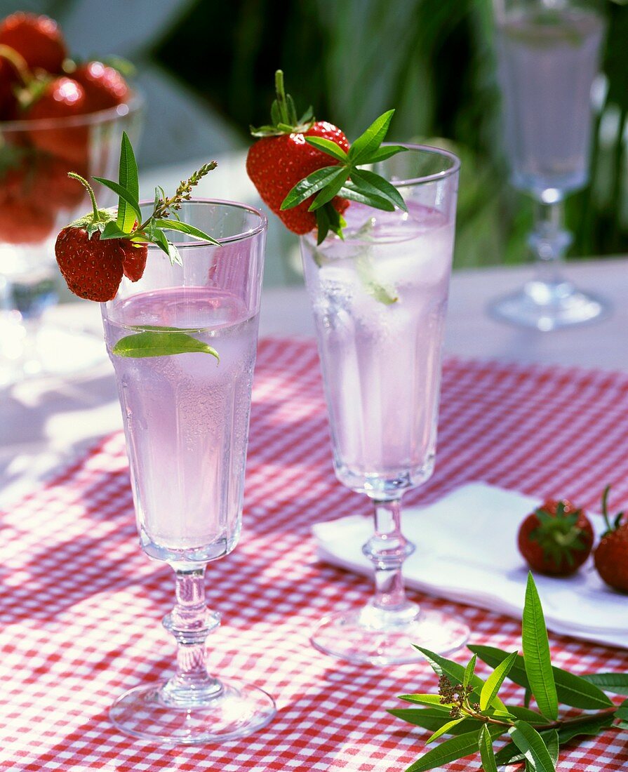 Mineral water with lemon verbena and strawberries