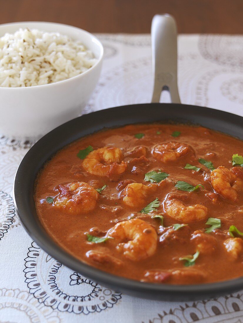 Prawns in tomato sauce and rice with cumin seeds