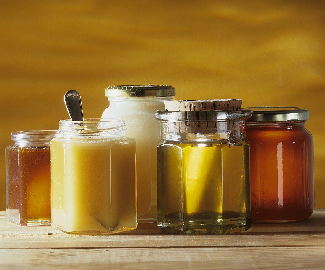 Various types of honey in jars