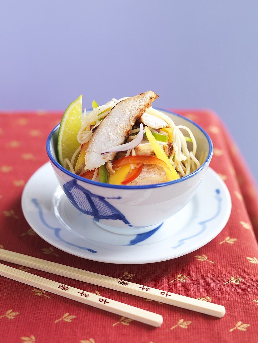 Asian noodle stir-fry with chicken and mango